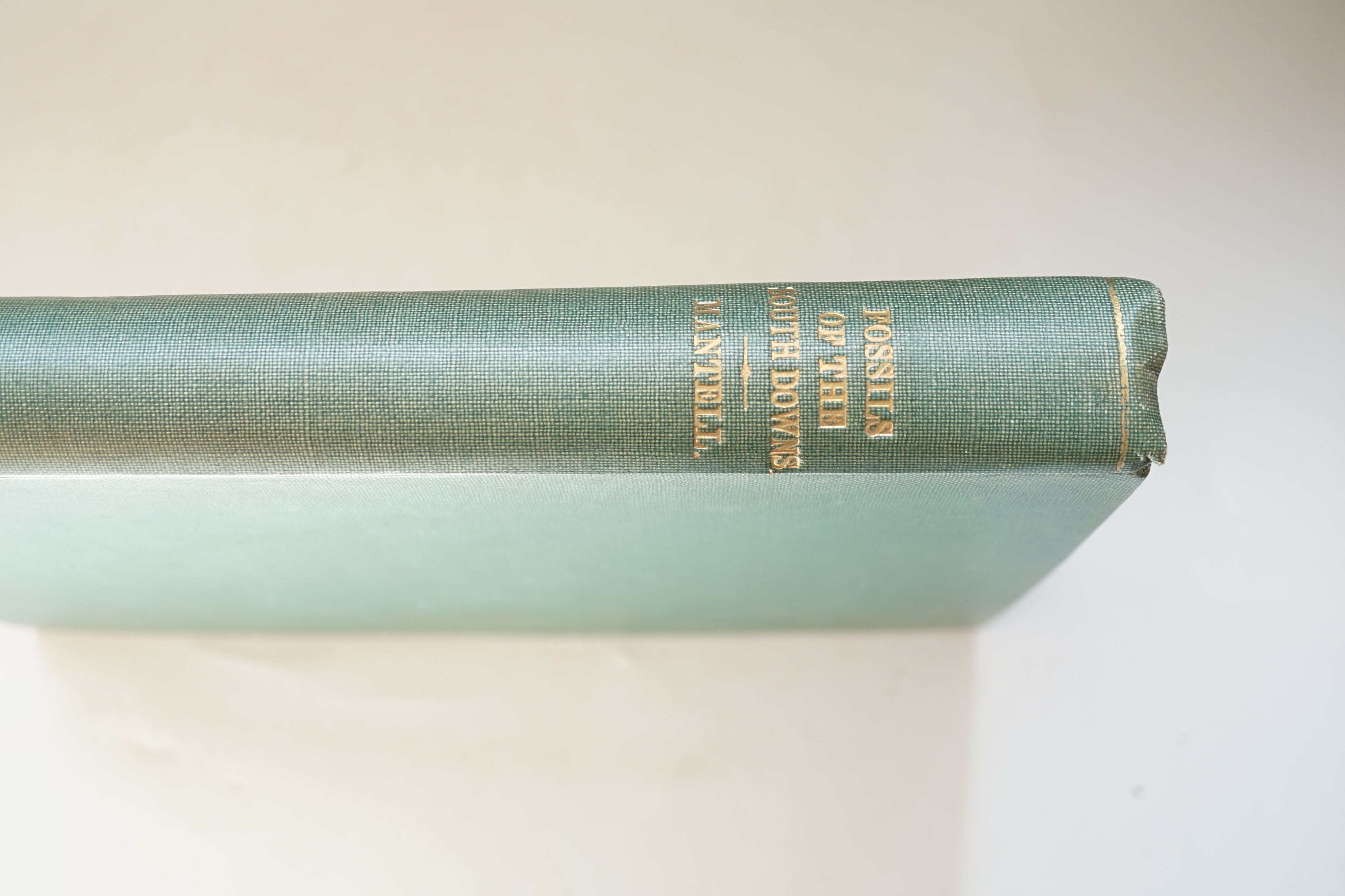 Mantell, Gideon - The Fossils of the South Downs; or, Illustrations of the Geology of Sussex, first edition, 4to, rebound green cloth, half title, 42 engraved plates (2 folding) including the hand-coloured map, index at